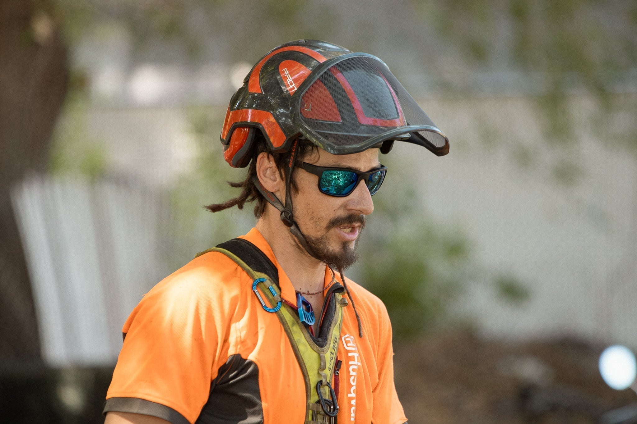 Worker Wearing a Protective Helmet and ANSI Z87+ Safety Glasses