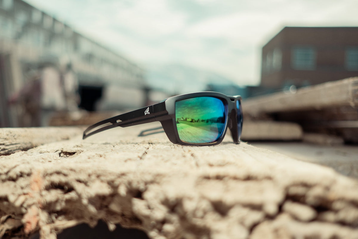 green mirror lens safety glasses on truck step