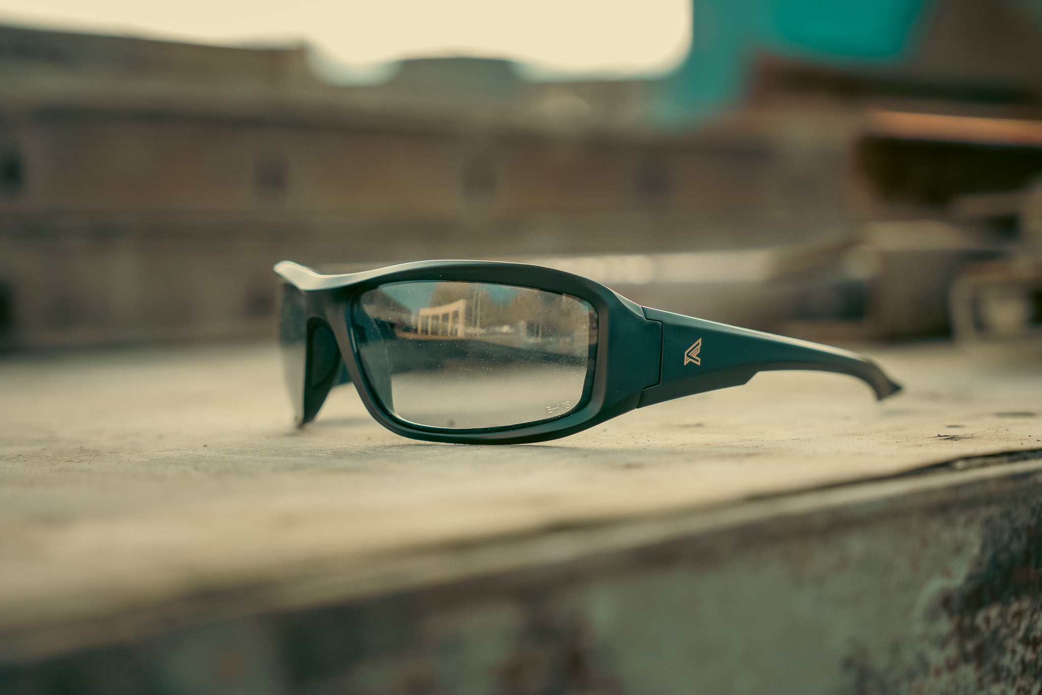 clear safety glasses sitting on a metal surface outdoor
