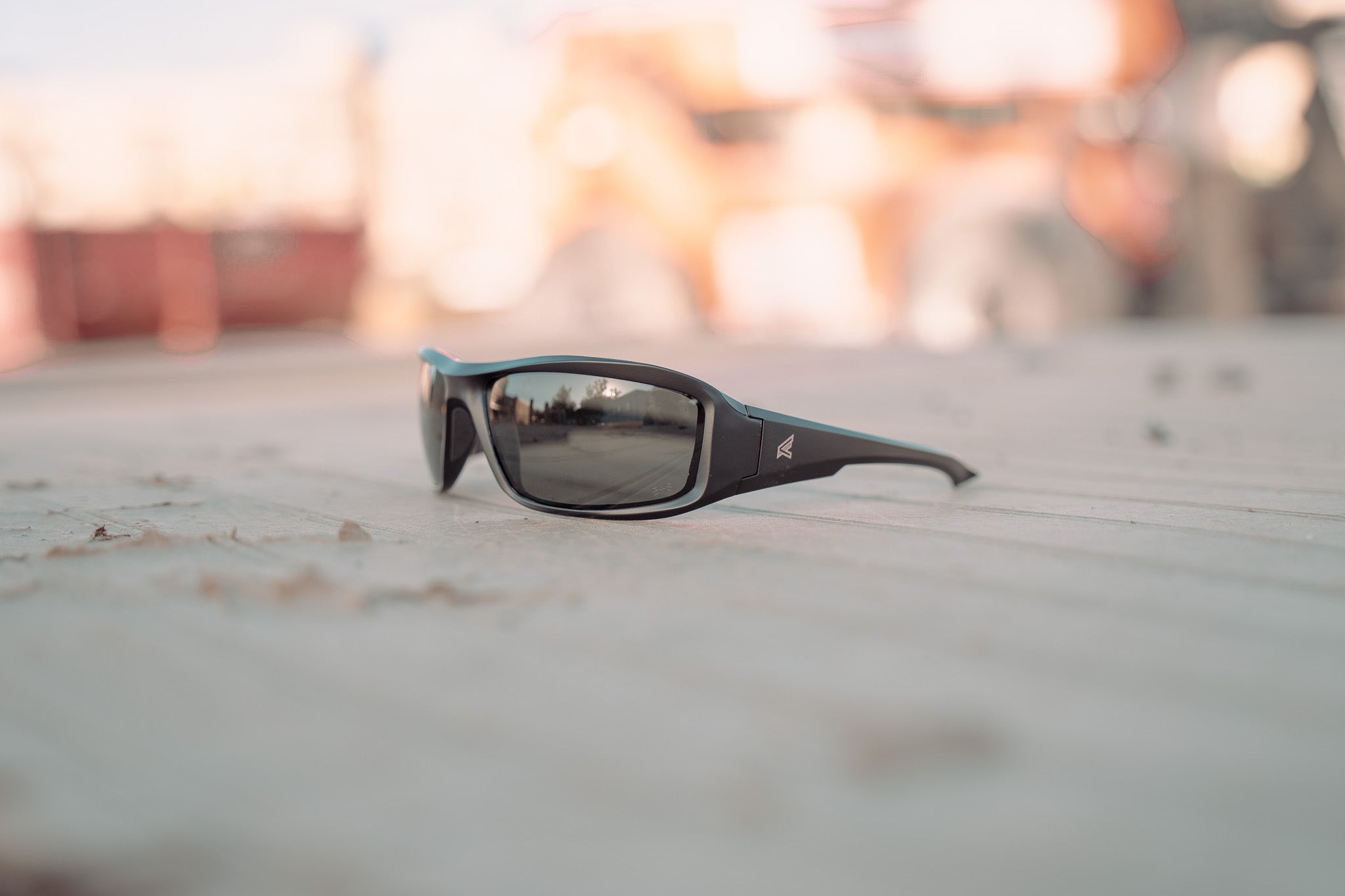 safety glasses sitting on a flat surface at a construction site