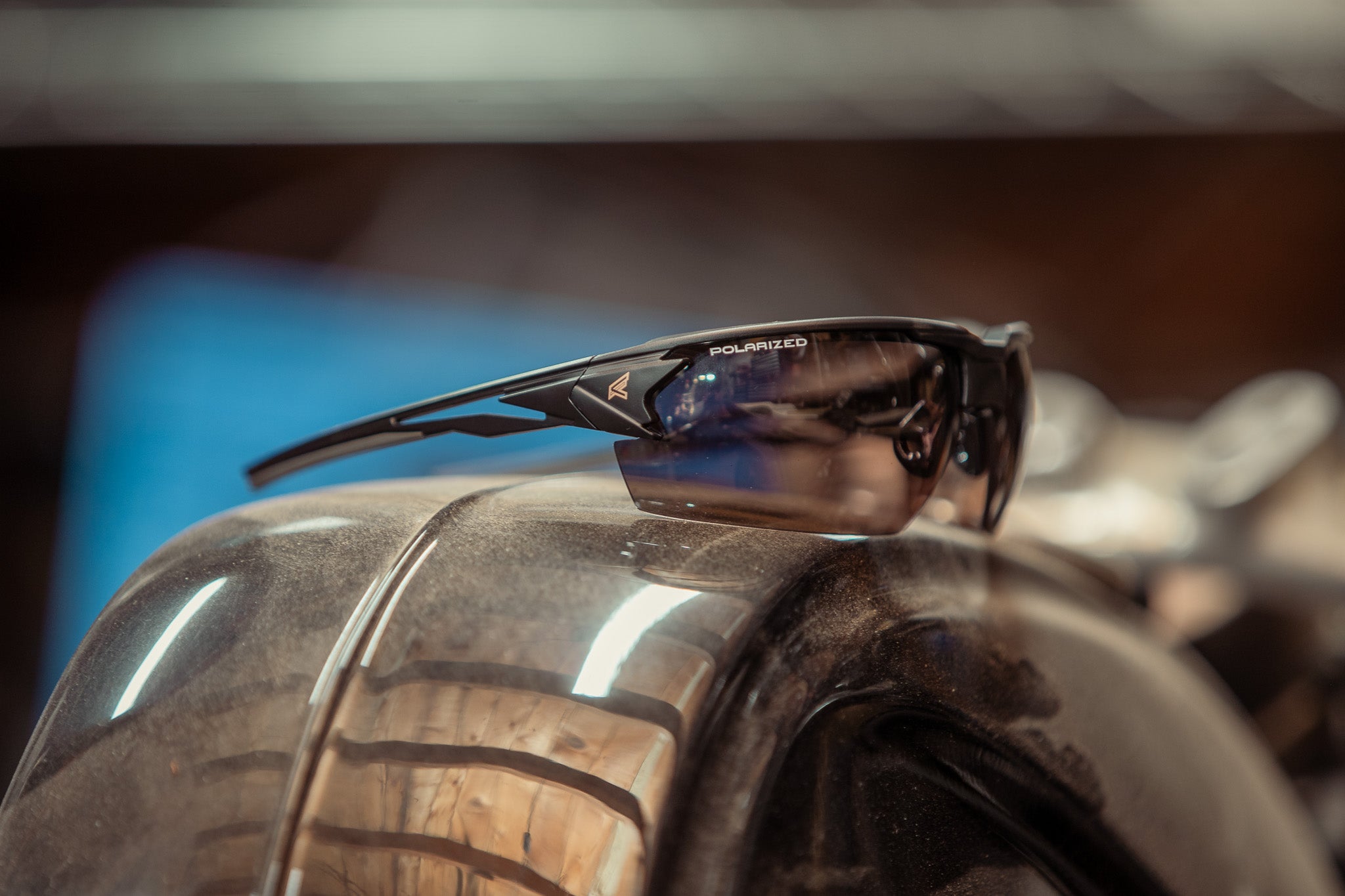 safety glasses on motorcycle gas tank