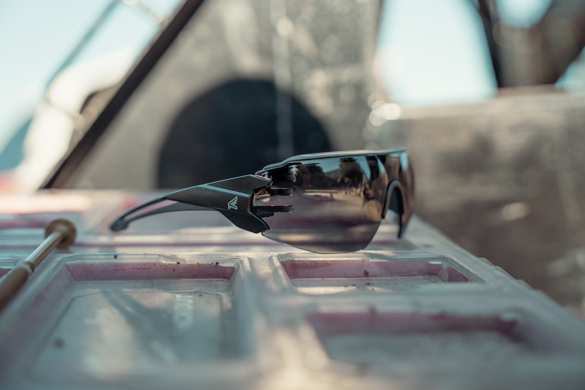 black safety glasses on toolbox outside